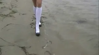 Black high heels & white socks at the beach