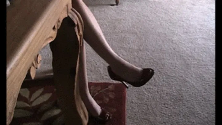 AMY VORE: Kelly wears peep toe high heels barelegged