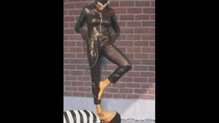 Mistress Teidra in Catwoman Trample Passout