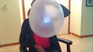 Business Woman blows big bubbles part 2