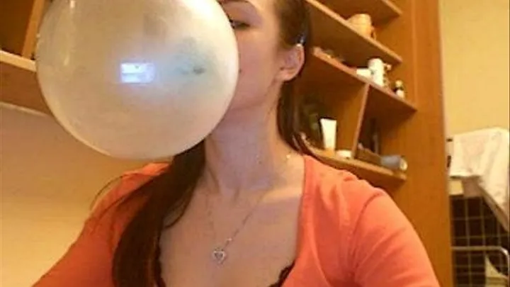 Blowing bubble gum