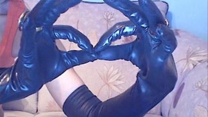 Sexy hands movement wearing black gloves and rings