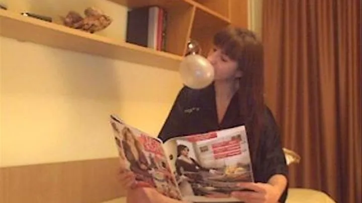 SNAPPING AND BLOWING WHILE I READ MY FAVORIT MAGAZINE