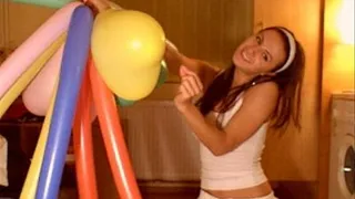 Popping a bouquet of balloons