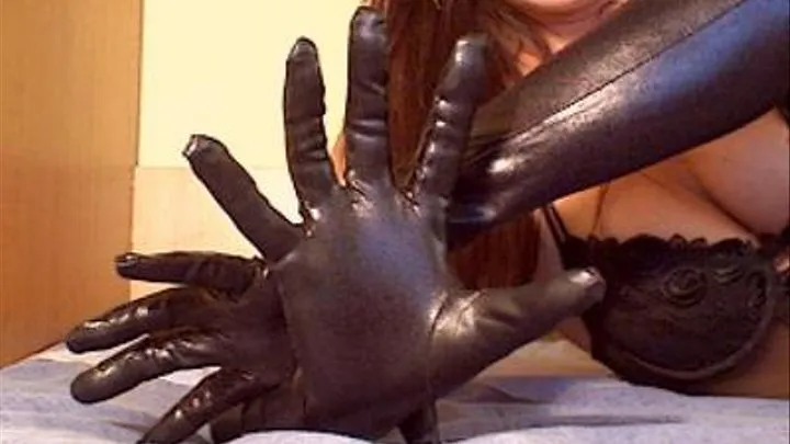 Sexy hands movements with black gloves on