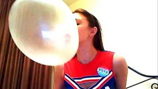 Sexy Cheerleader Blows Huge Bubbles