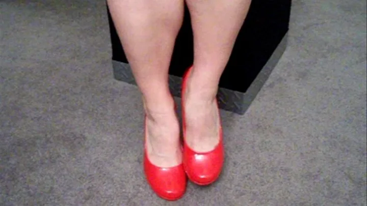 Red shoes and metal dildo