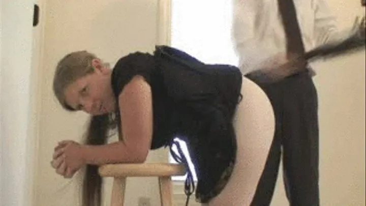 flogged over pantyhose while bent over (side view)