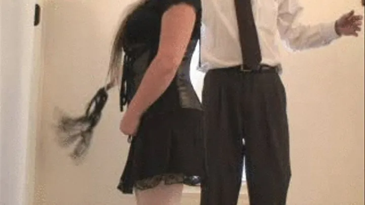 flogged over skirt while standing (side view)