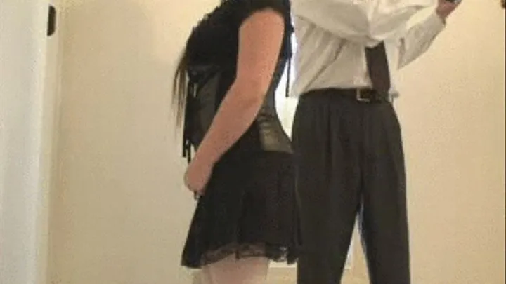 belted over skirt while standing (side view)