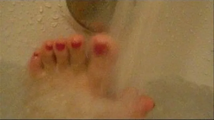 Toes soaking in bath