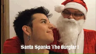 Santa Spanks Burglar