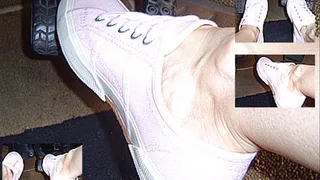 Pedal pumping in pink sneakers