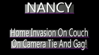 NANCY attacked while on her couch!