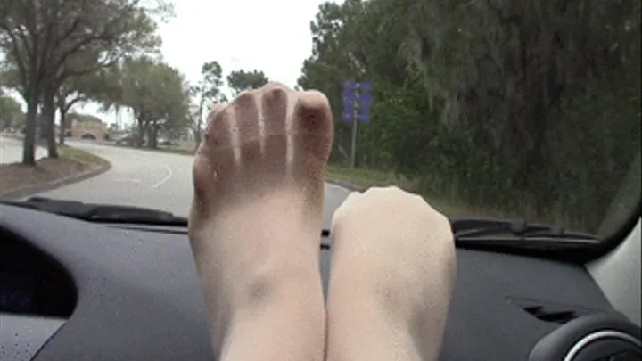 Anna's Nylon Feet on the Dashboard