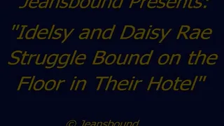Idelsy and Daisy Rae Bound on the Floor