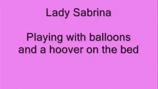 Lady Sabrina playing with Balloons and a Hoover