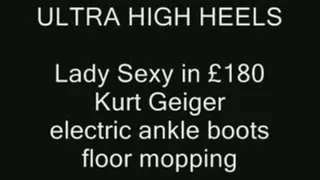 Lady Sexy in £180 Kurt Geiger Boots Mopping