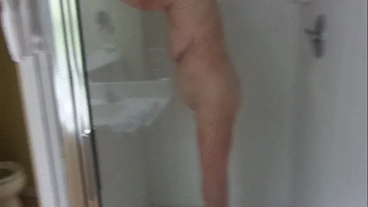 Sexy Mature Blonde Granny Takes a shower as we spy!