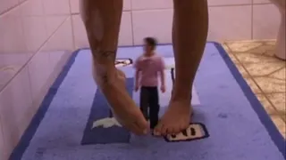 Blonde takes a bath and play with a doll