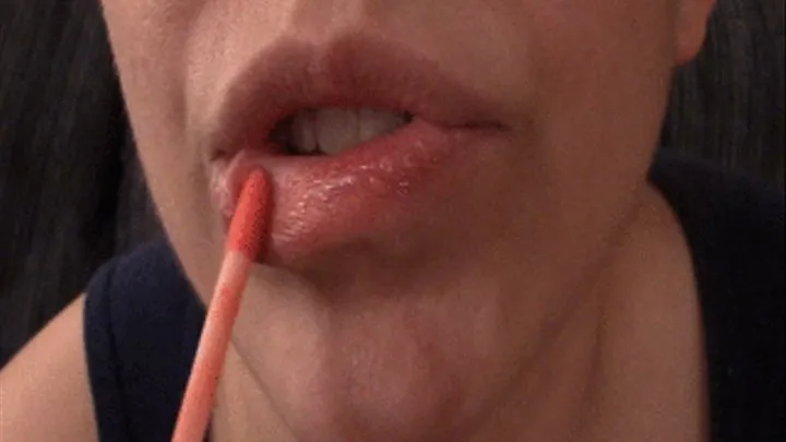 Applying Light Pink Lip Gloss and Soft Puckering Kisses 10 13 14--MVI 6566