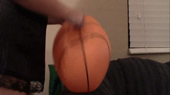 Deflating Orange Basketball Style Beach Ball--9 10 14--MVI 6242
