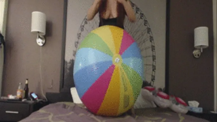 Deflating Pastel Rainbow Striped Beach Ball--4 1 15--Video 11