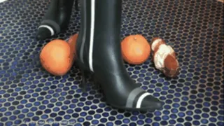 Oranges crushed under Gumboots