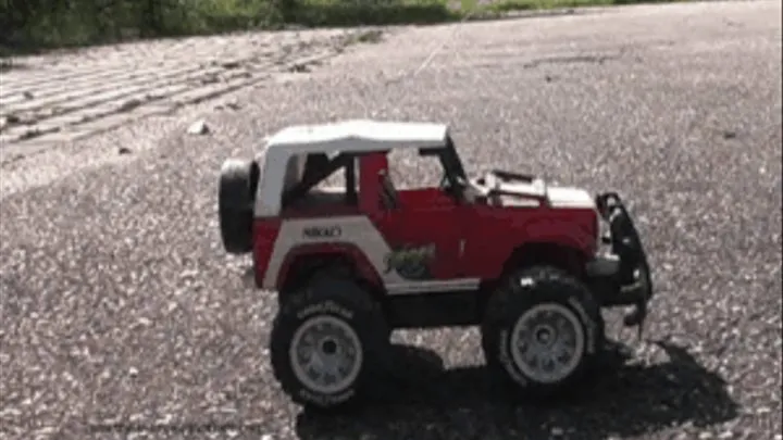 Jeep crushed under wooden Clog