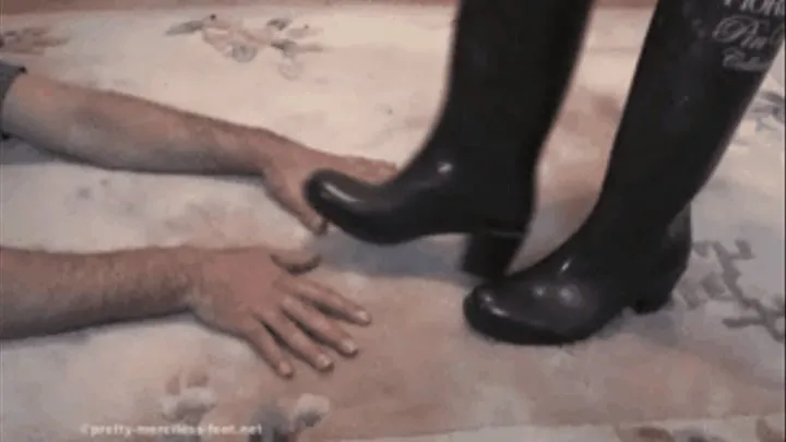 Hands under Gum Boots