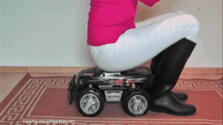 Big RC-Car under Riding Boots