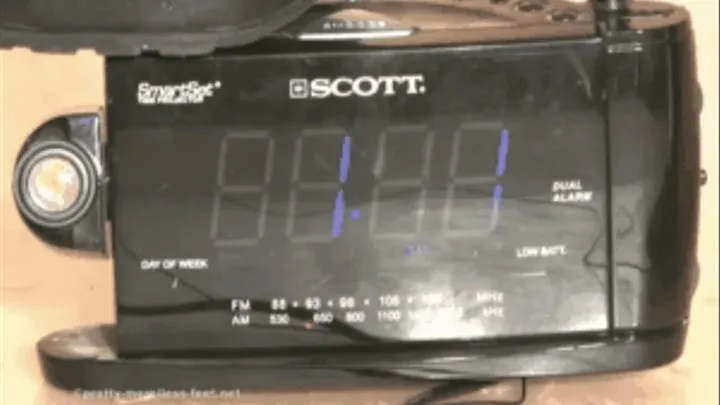 Radio Alarm Clock under merciless Boots