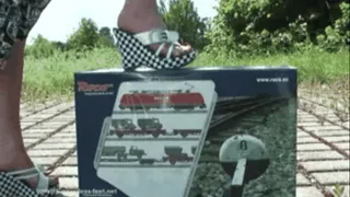 Train under Wedges, High-Heels and Car