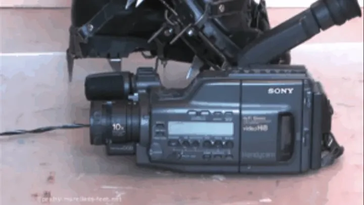 Poor Sony Hi8 Cam under Christins cruel Boots