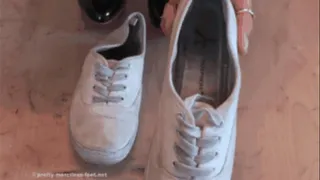 Old Sneakers crushed under High Heels