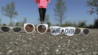 Sun Glasses under Combat Boots (floor view)