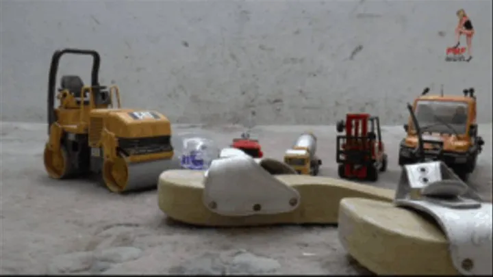 Trucks crushed under flat wooden Mules (floor view)