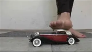 Model Car under pretty naked feet