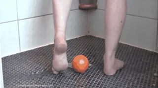 Oranges under bare Heel