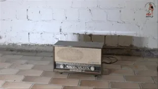 Old historical Radio crushed under Combat Boots