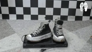 -Player under old worn Chucks