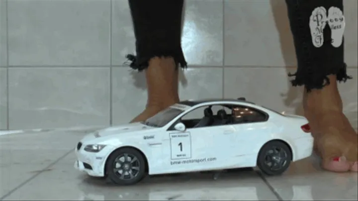 RC Car under naked feet and clear heels floor view