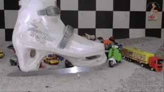 Toy cars and toy stuff under ice skating shoes floor view