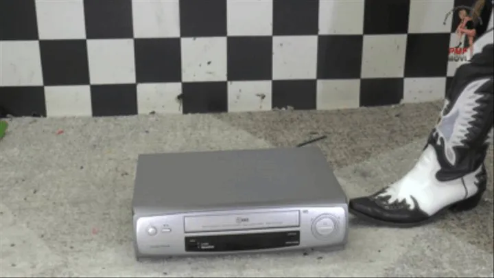 VCR Player under Cowgirl Boots