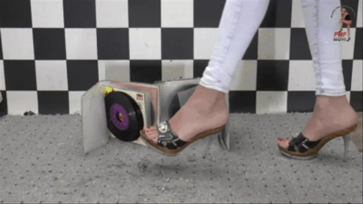 Old records crushed under high heel Mules