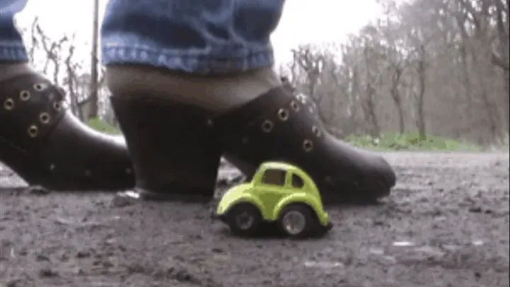 Two Cars under Christins old wooden Clog