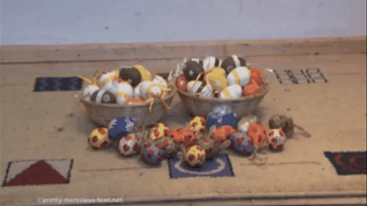 Easter eggs crushed under wooden Mules