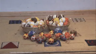 Easter eggs crushed under wooden Mules