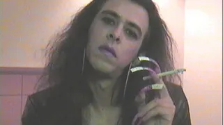 Crossdresser smoking with extremly long nails