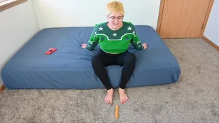 Dylan foot plays with a toy